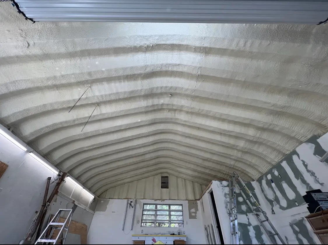 Spray polyurethane foam applied to the underside of a metal roof deck in East Nottingham